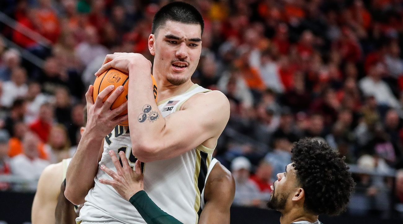 Purdue center Zach Edey (15) grabs a rebound against Michigan State forward Malik Hall (25) during the second half of quarterfinal of Big Ten tournament at Target Center in Minneapolis, Minn. on Friday, March 15, 2024.  